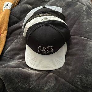 Hats snap back. 5 hats